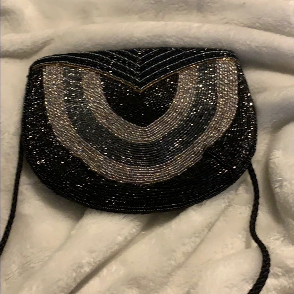 - Black and silver cross body bag